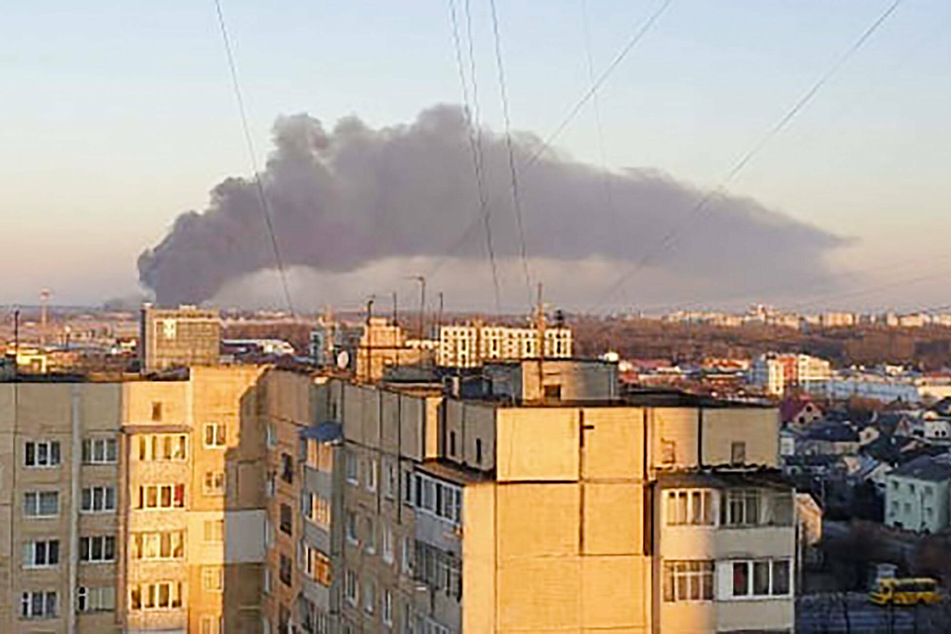 Billowing smoke in the aftermath of Russian attacks on an aircraft repair facility in Lviv.