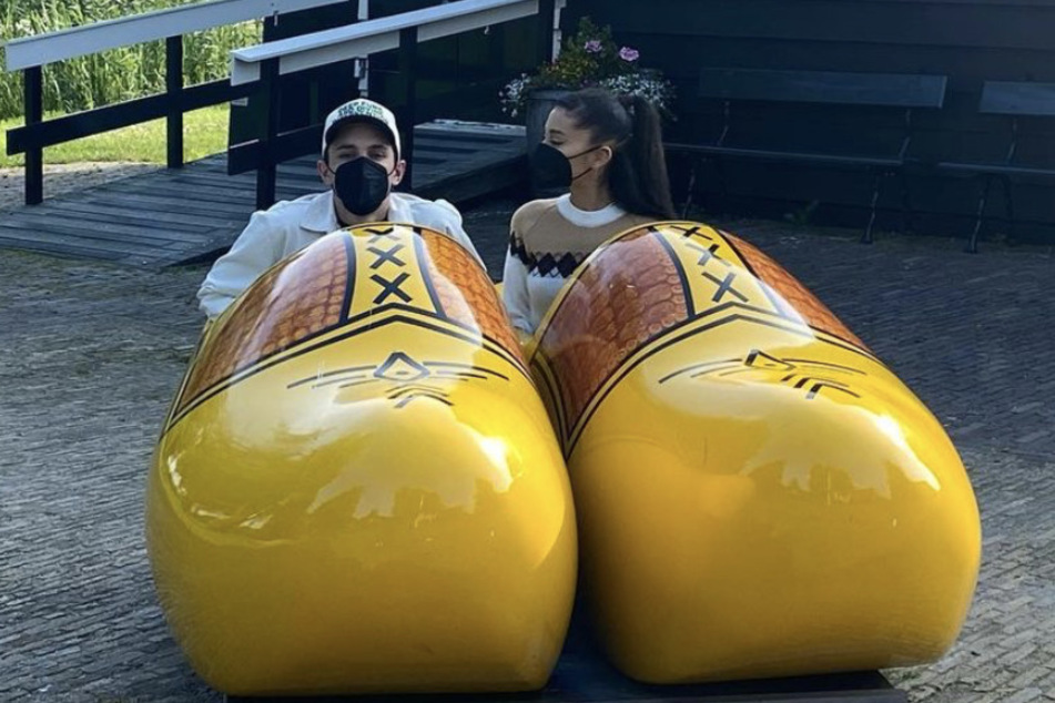 Ariana Grande (r.) shared a few snaps from her honeymoon with Dalton Gomez (l.).