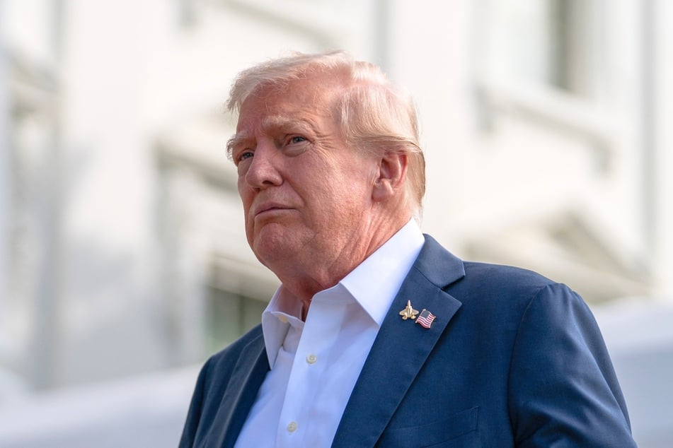 President Donald Trump speaking to the press before boarding Marine One from the South Lawn of the White House in Washington, DC, on September 26, 2025.