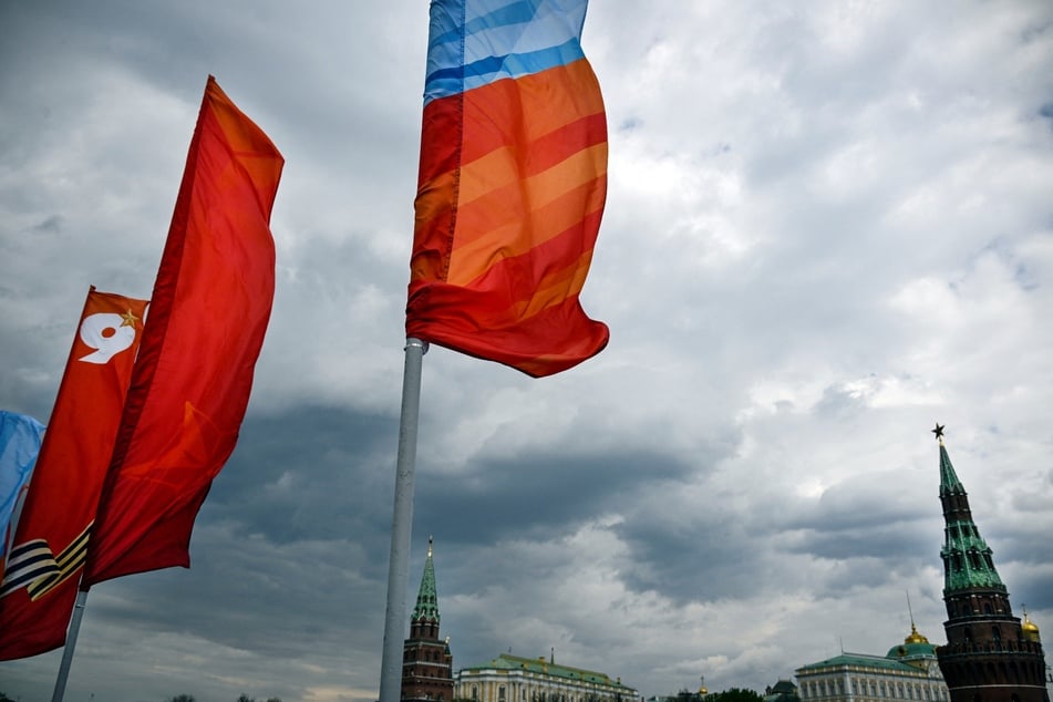 Flags wave in front of the Kremlin in central Moscow on May 5, 2026, ahead of the Victory Day military parade.