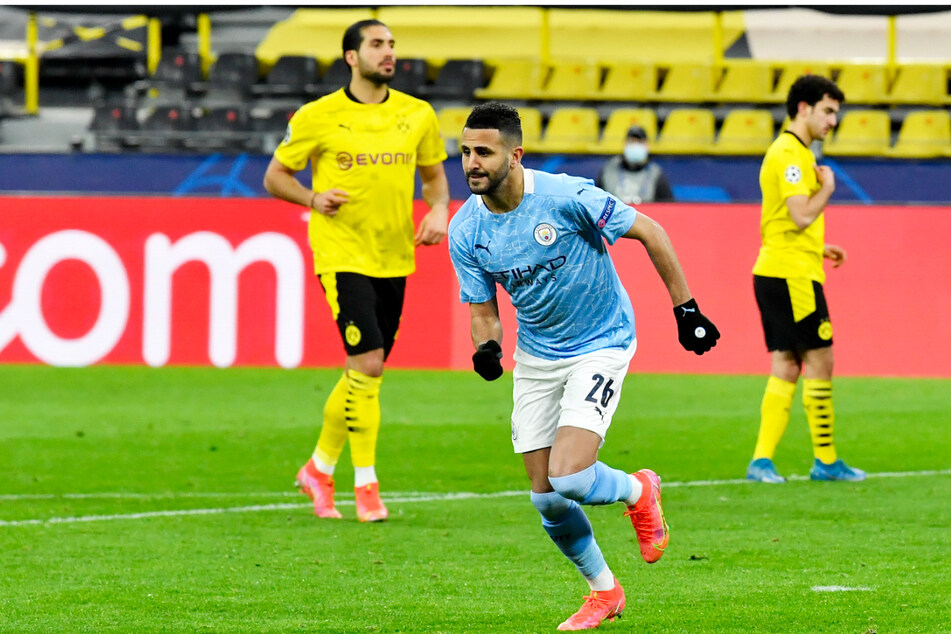 Riyad Mahrez (M.) nutzte Emre Cans (l.) entscheidenden und zugleich unglücklichen Fehler aus, der Borussia Dortmund deshalb den Einzug ins Halbfinale kostete.