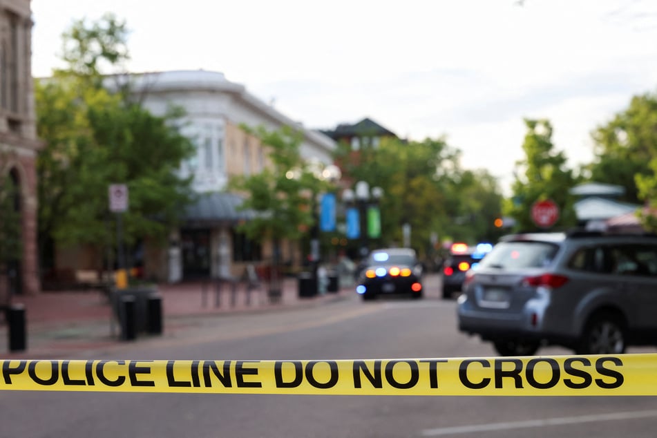 Police tape is drawn at the scene after an attack that injured multiple people in Boulder, Colorado, on June 1, 2025.