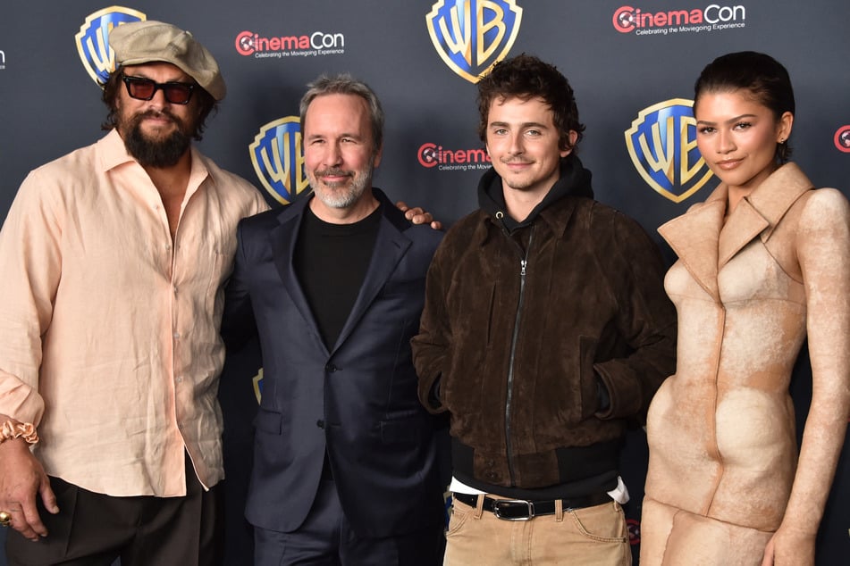(From l. to r.) Jason Momoa, Denis Villeneuve, Timothée Chalamet, and Zendaya debuted a sneak peek at Dune: Part Three during the CinemaCon presentation.