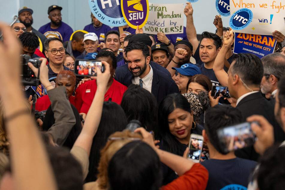 Zohran Mamdani is surrounded by supporters after a press conference with union leaders in New York City on July 2, 2025.