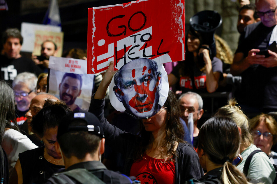 Protestors gather against Israeli Prime Minister Benjamin Netanyahu near his residence in Jerusalem on November 4, 2023.