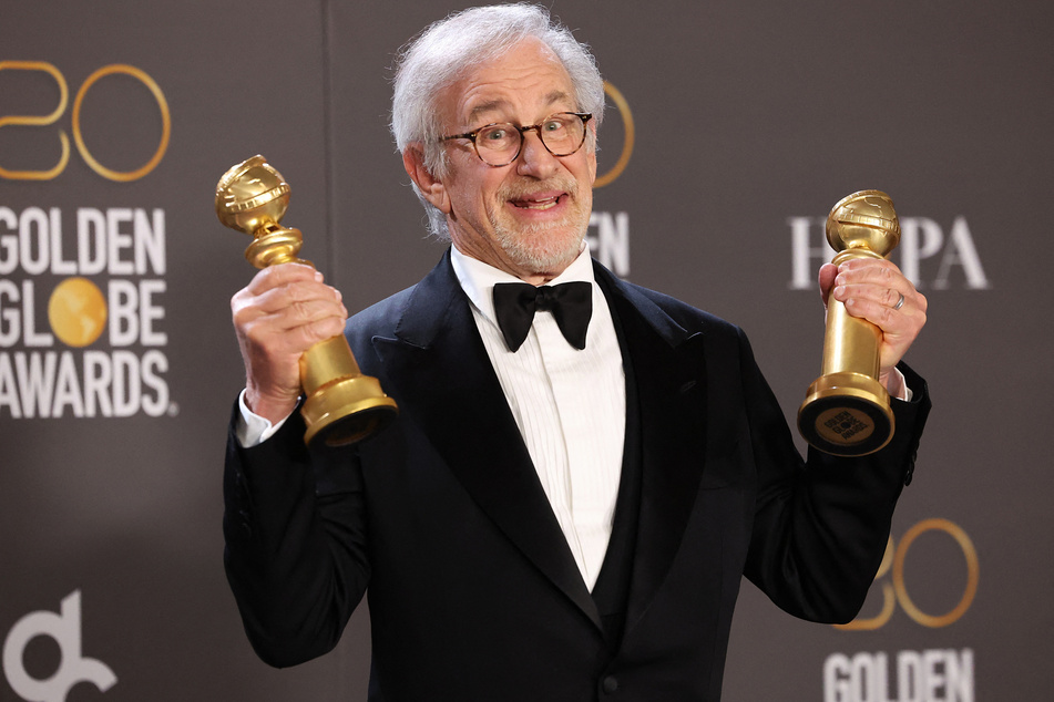 Steven Spielberg poses with his awards for Best Director in a Motion Picture and Best Picture Drama for The Fabelmans at the 80th Annual Golden Globe Awards in Beverly Hills, California.