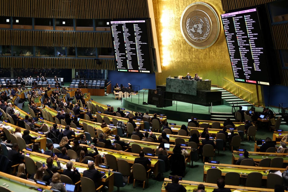 Ambassadors vote on a resolution to reaffirm Ukraine's territorial integrity, during a United Nations General Assembly meeting on the third anniversary of Russia's invasion of Ukraine, at UN Headquarters in New York City on Monday.