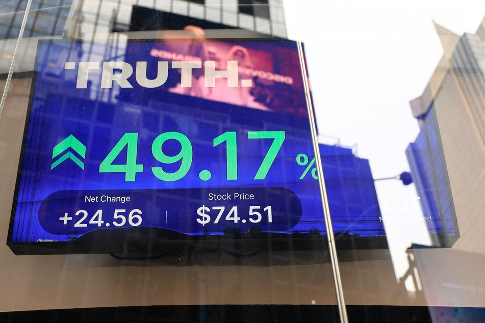 Trump Media &amp; Technology Group stock market trading information seen on a television at the Nasdaq Marketplace in New York City on March 26, 2024.