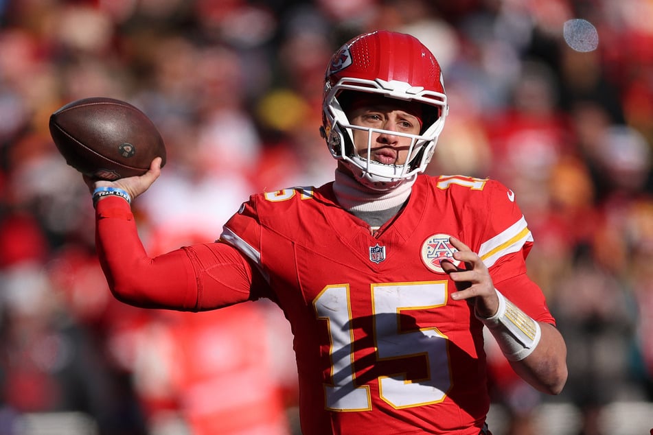 Patrick Mahomes of the Kansas City Chiefs throws a pass during the second quarter against the Los Angeles Chargers at Arrowhead Stadium on December 14, 2025.