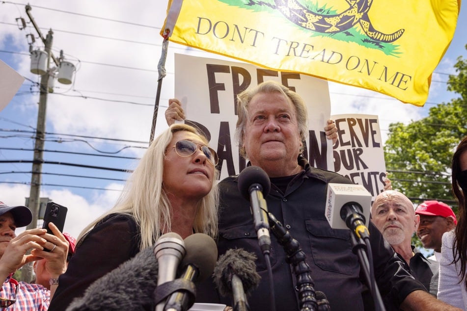 Congresswoman Marjorie Taylor Greene (l.) and Steve Bannon deliver a press conference outside the Federal Correctional Institution in Danbury, Connecticut on July 1.
