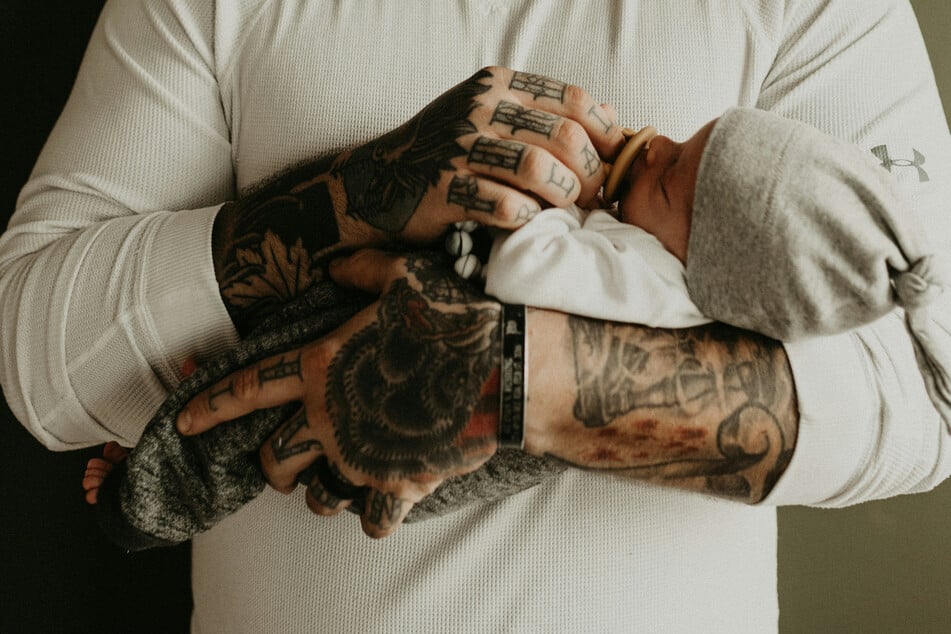 A newly viral and highly disturbing video shows a one-year-old screaming in distress while its parents tattoo its arm. (stock image)