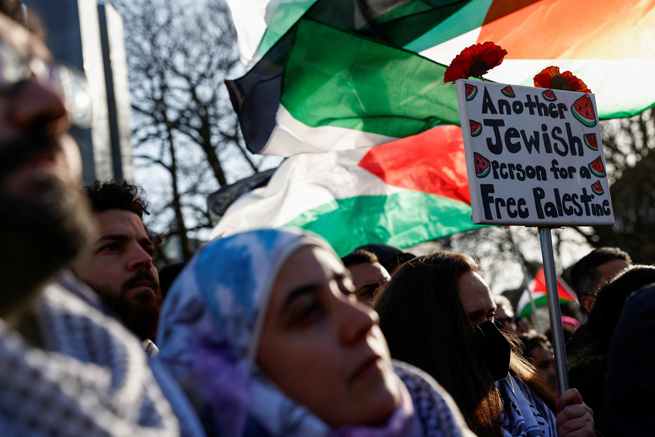 Protesters rally for a ceasefire in Gaza and Palestinian freedom outside the International Court of Justice in The Hague, Netherlands.