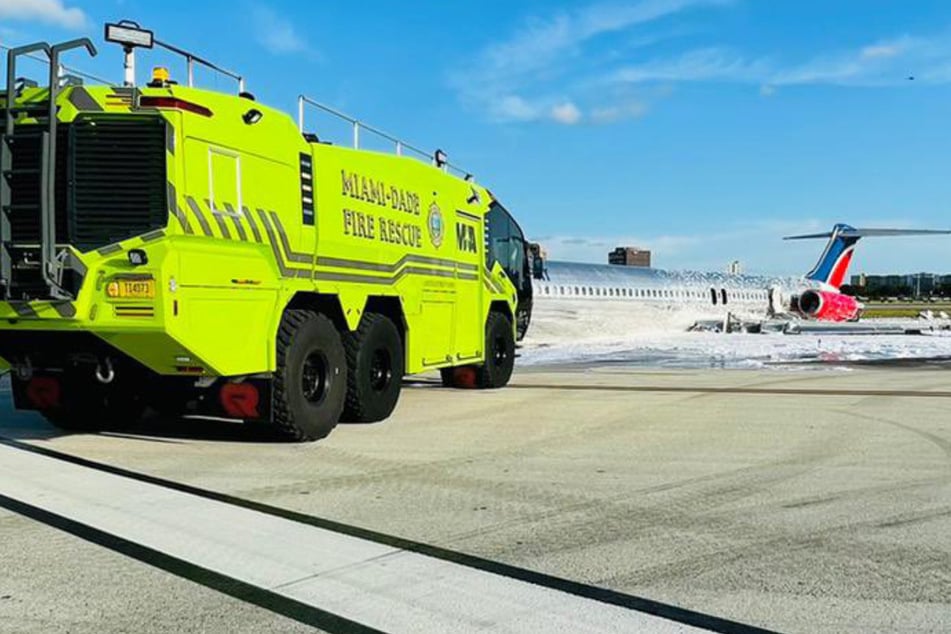Plane catches fire on landing at Miami Airport