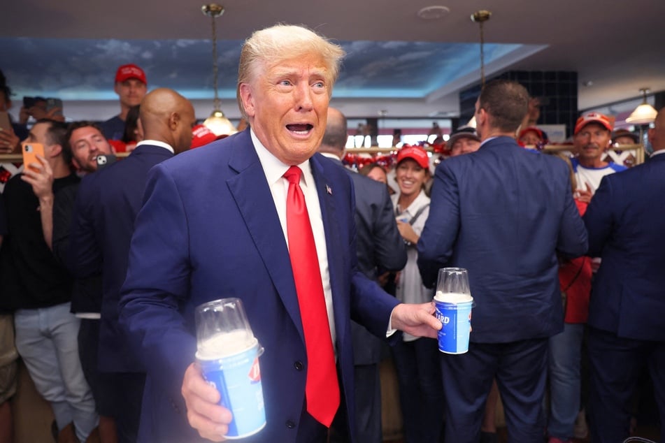 Donald Trump hands out Blizzards and milkshakes during a stop at a DQ restaurant on July 07, 2023, in Council Bluffs, Iowa.