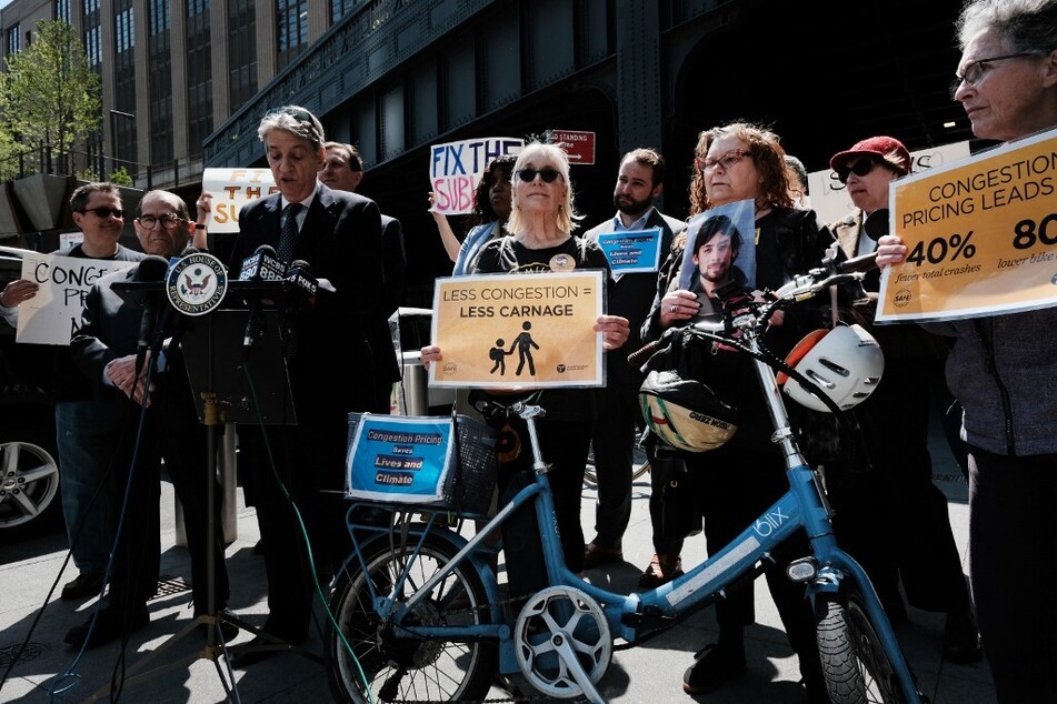 Local politicians and transportation and environmental advocates hold a news conference outside the Lincoln Tunnel urging the immediate implementation of New York’s Central Business District Tolling Program.