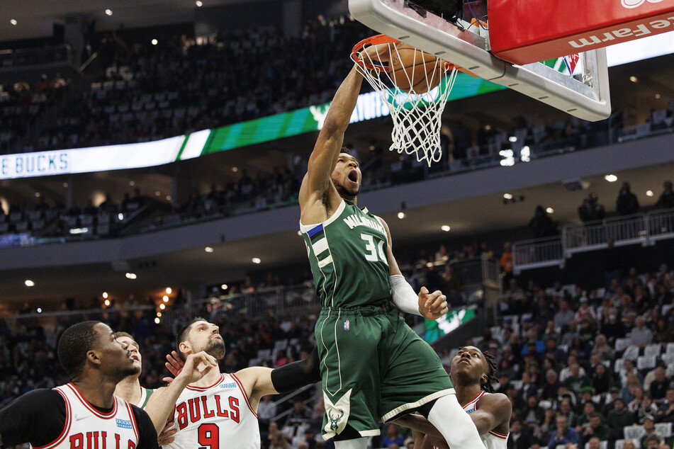 Giannis Antetokounmpo (c.) led the way for the Bucks as they progressed in the playoffs.