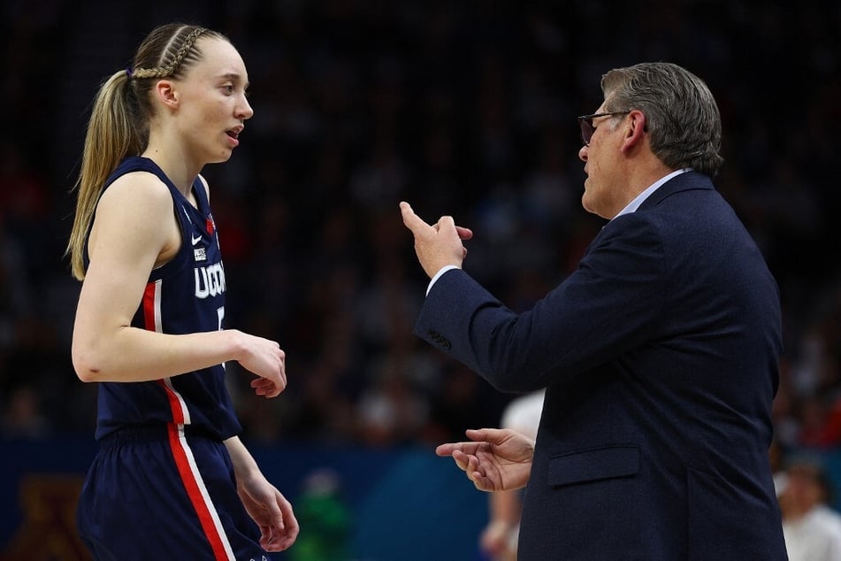 Nearly a year since tearing her ACL, UConn basketball star Paige Bueckers (l) is expected to be fully ready by the start of the 2023-24 season this fall.