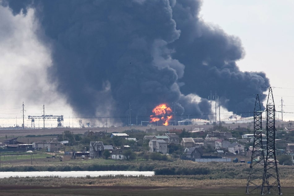 Ukraine has said its forces struck an oil terminal in Crimea overnight, sparking a fire, as the war with Russia rages on.