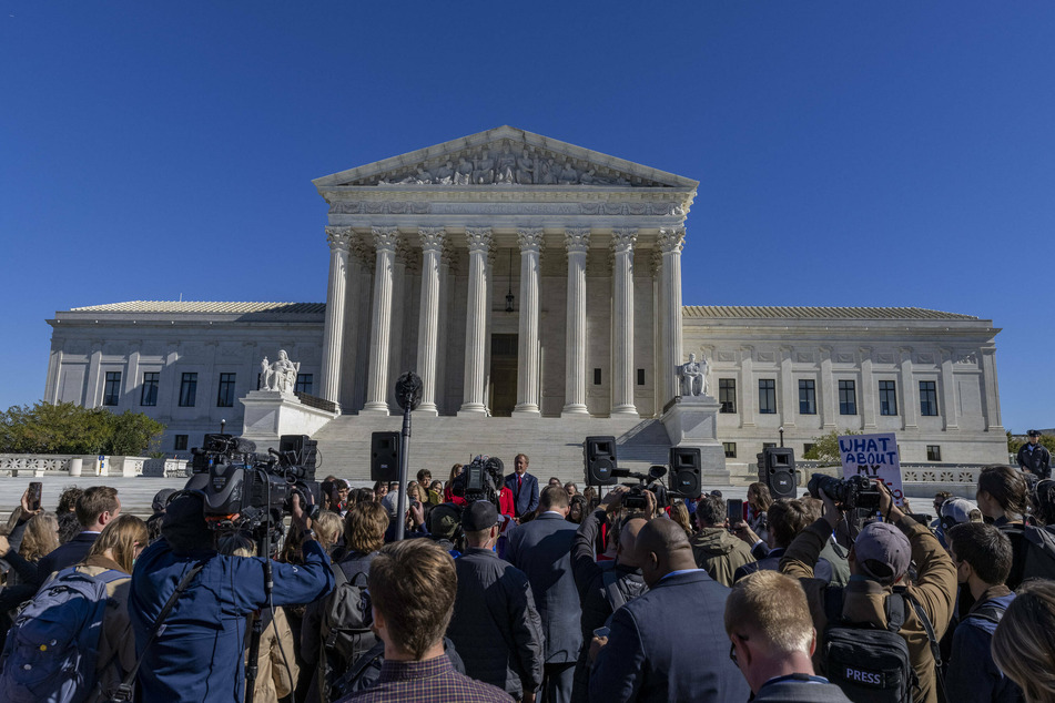 Texas Attorney General Ken Paxton spoke at the Supreme Court on Monday, as the justices heard arguments in a challenge to the controversial Texas abortion law.