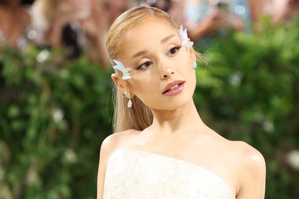 Ariana Grande has been embracing all things sparkly in her Glindacore era – now she's partnered with Swarovski to take that fashion commitment up a notch!