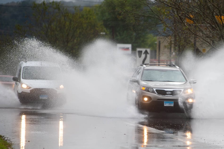 Two dead after "unprecedented" flooding pounds Connecticut