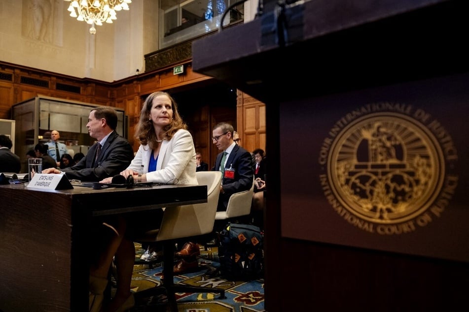 US Deputy Legal Counsel Richard Visek (l.) and Legal Advisor to the US Department of State Margaret Taylor (r.) attend a hearing before the International Court of Justice in The Hague, Netherlands, as part of proceedings aiming to set a legal framework on how countries should tackle climate change.