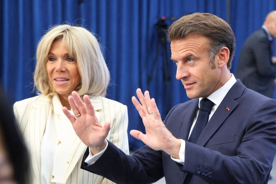 French President pushes back on speculation after wife is caught on video shoving him in the face