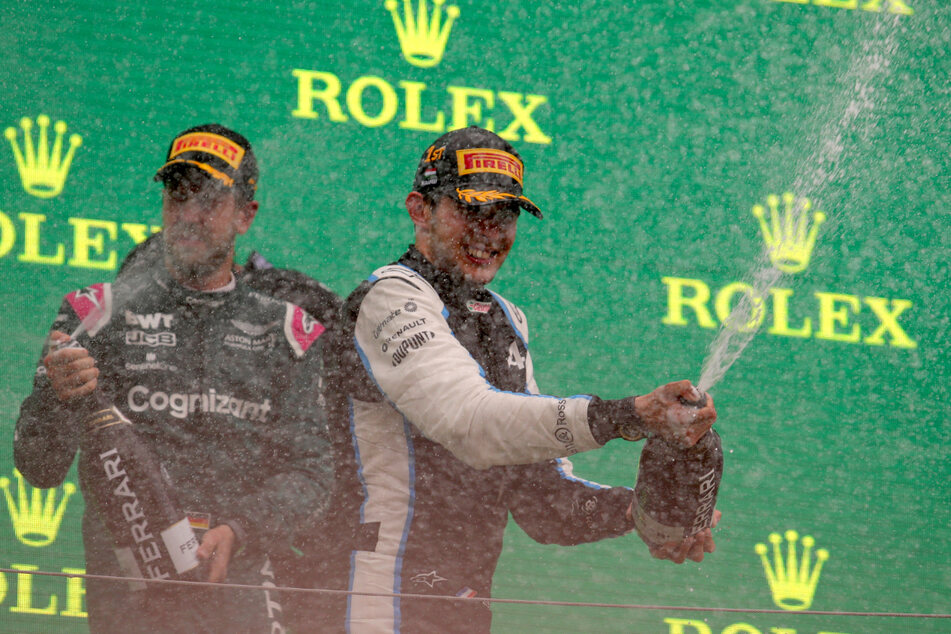 Der erste Grand-Pix-Erfolg für Esteban Ocon (24, rechts) wird euphorisch bejubelt. Sebastian Vettel (34, links) ist Podestplätze dagegen schon gewohnt.