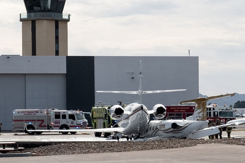 A plane owned by Mötley Crüe singer Vince Neil collided with a parked jet after veering off the runway while landing at Scottsdale Airport.