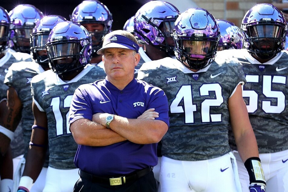 TCU head coach Sonny Dykes (c) will lead his undefeated 9-0 team against the Texas Longhorns this Saturday in one of the most exciting Big 12 matches to date.
