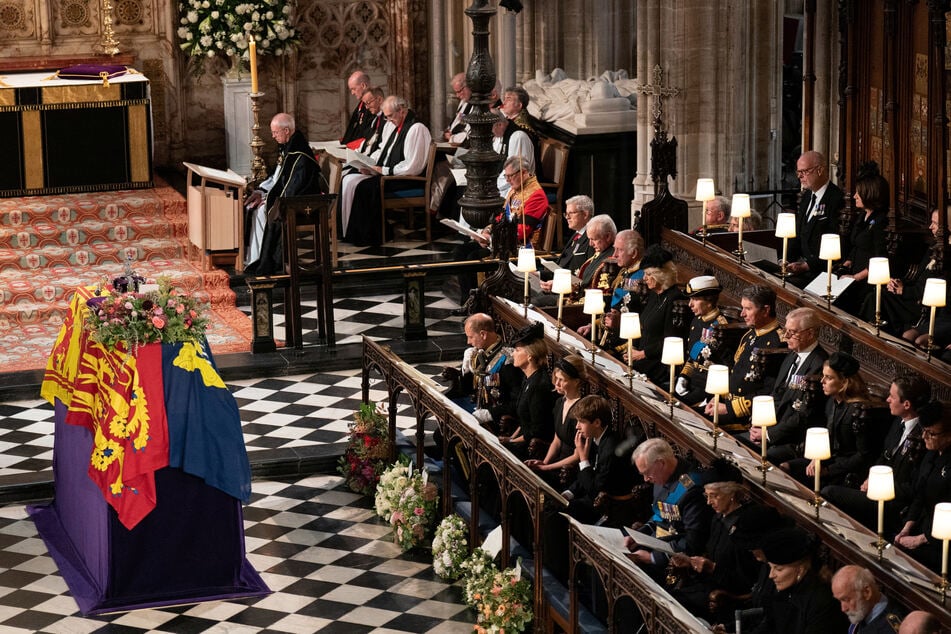 The Queen's coffin draped in the Royal Standard during the Committal Service at St George's Chapel in Windsor Castle.