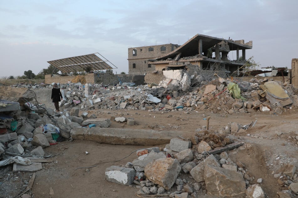 A man inspects the rubble of a house hit by a US strike on the weekend in Yemen's northern Saada province on Monday.