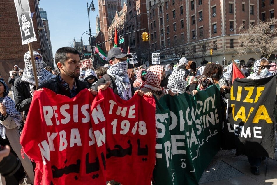 Demonstrators rally outside of Columbia University to support Palestine and to protest the arrest and detention of Mahmoud Khalil.