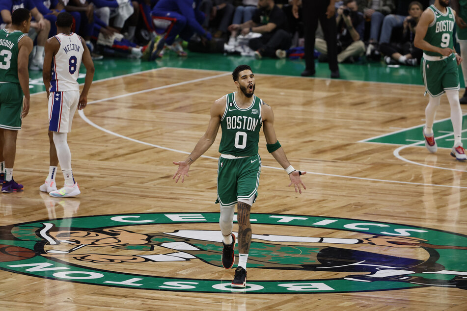 Jayson Tatum set a new NBA points record for a Game 7 to lead the Celtics to a 112-88 win over the Sixers and a return to the Eastern Conference finals.