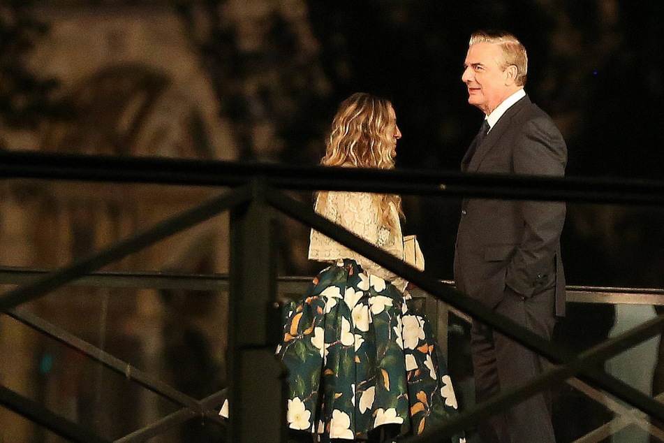 Chris Noth (r.) was seen filming his cameo for the SATC revival, And Just Like That, with costar Sarah Jessica Parker in October.