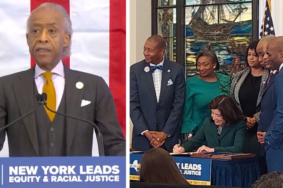 Reverend Al Sharpton (l.) praised the New York governor for signing the bill into law as he spoke at Tuesday's ceremony.