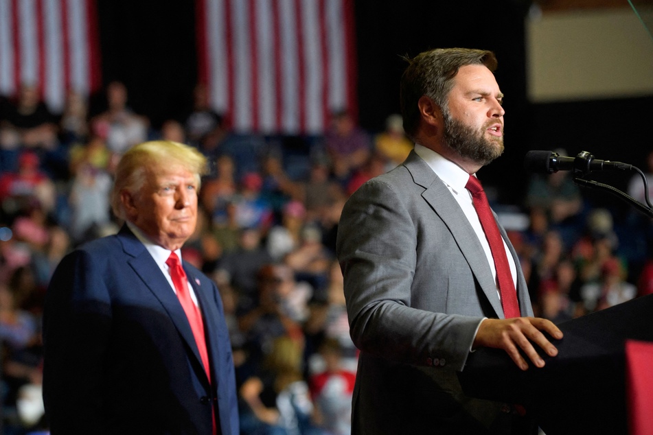 JD Vance and Donald Trump speak at a Save America Rally in Youngstown, Ohio, on September 17, 2022.