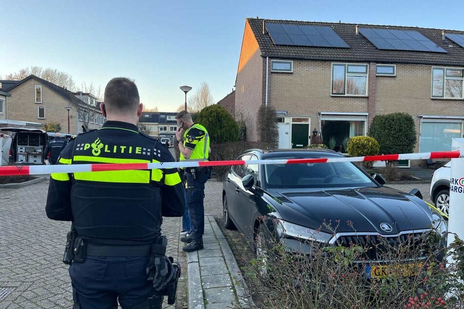 Authorities at the crime scene in Nieuwegein, Netherlands, where an eleven-year-old girl was stabbed to death.