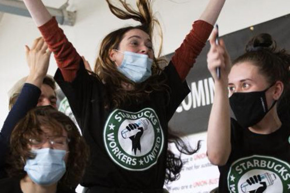 Baristas in Buffalo, New York, celebrate after winning the first unionized Starbucks store in the country.