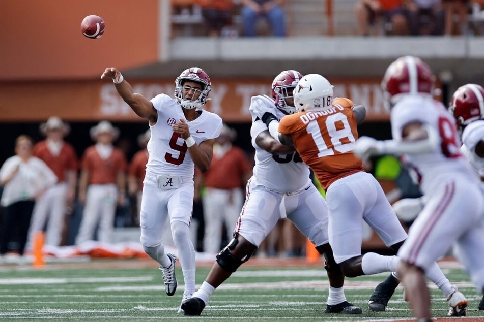Bryce Young of the Alabama Crimson Tide throws a pass in the first quarter in Saturday's game against the Texas Longhorns at Darrell K. Royal-Texas Memorial Stadium.