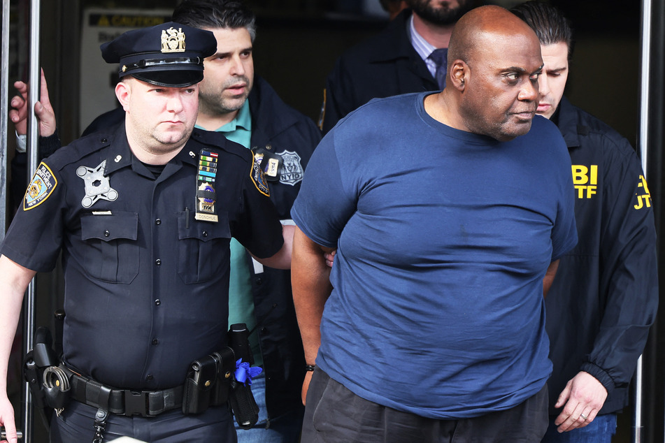 Frank James (r.) received multiple life sentences for his attack on a crowded New York subway in April 2022.