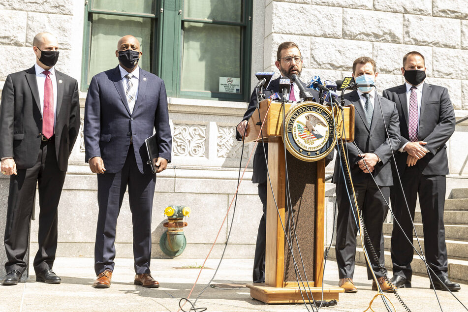 Acting US Attorney Seth DuCharme (third from r.) speaks at press briefing announcement of indictment for the murder of Jam Master Jay on August 17, 2020.