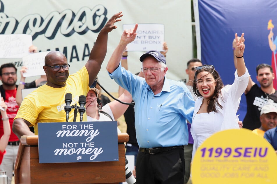 From l. to r.: Representative Jamaal Bowman, Senator Bernie Sanders, and Representative Alexandria Ocasio-Cortez attend a campaign rally in the Bronx borough of New York City.