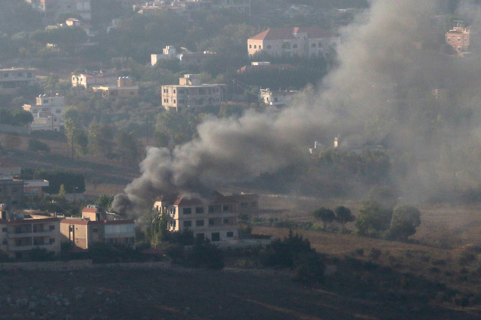 Smoke rises from the southern Lebanese town of Khiam following Israeli strikes.