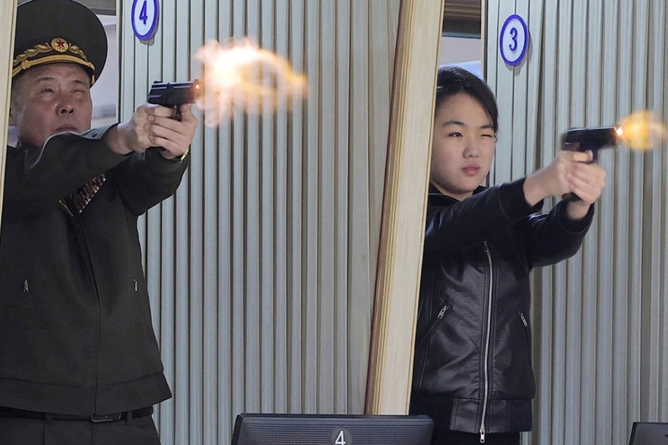 Kim Jong-un's daughter pictured firing gun in latest public hint at succession plan