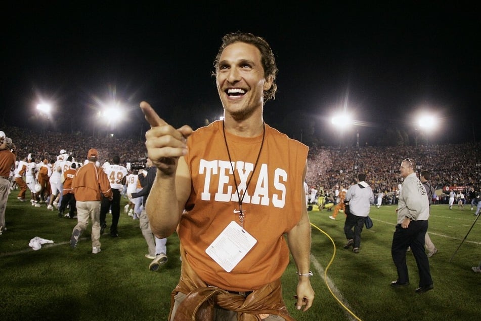 Matthew McConaughey celebrates on the field after the Texas Longhorns defeat the Michigan Wolverines in the 91st Rose Bowl Game.