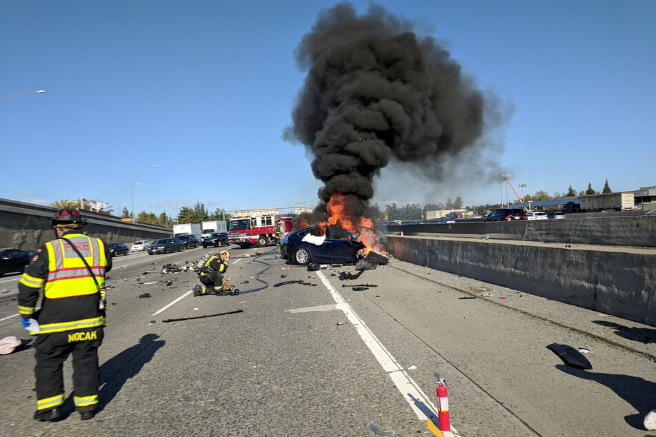 A Tesla Model X burns after crashing on US Highway 101 in Mountain View, California, on March 23, 2018.