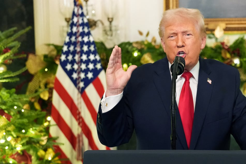 Trump promises "boom" in 2026 and blames Biden as he scrambles to defend economic agenda