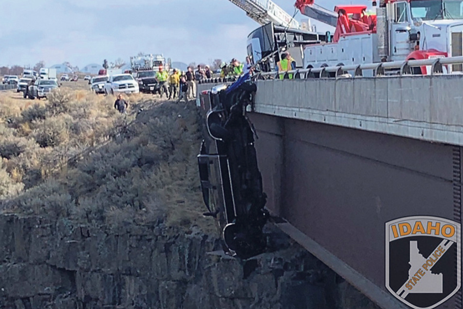 The pick-up truck was in danger of plunging into a 100-foot ravine.