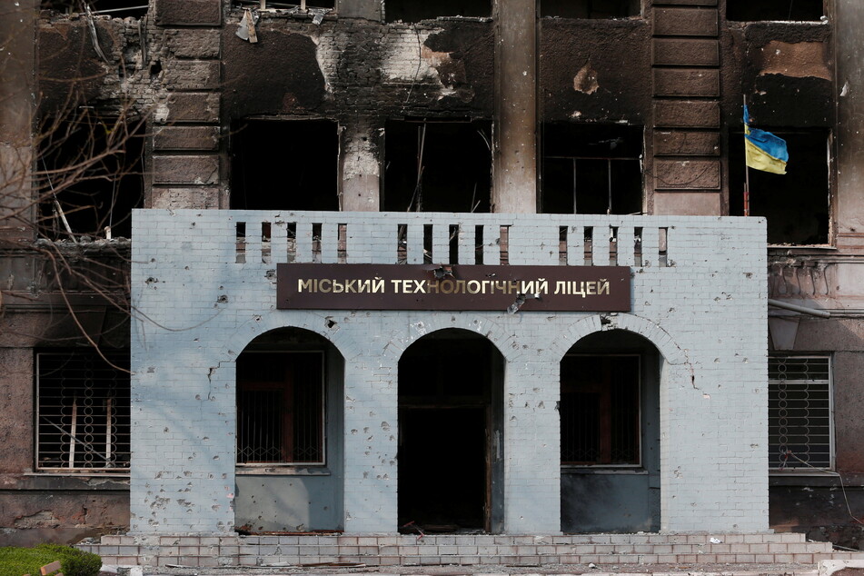 A burnt-out high school in Mariupol, which has been under siege for over 50 days.